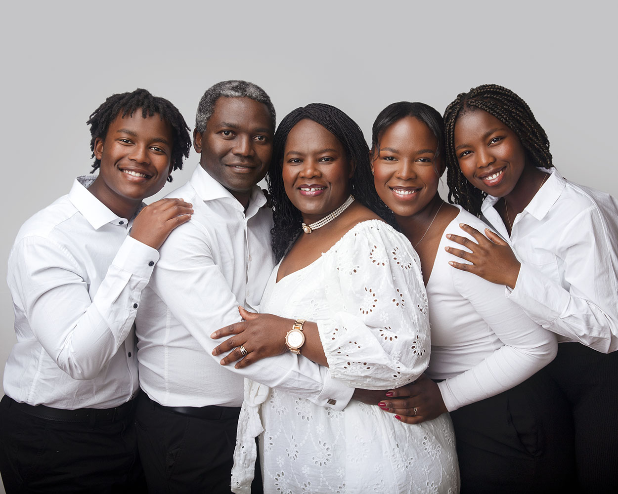 Family preparing for a photoshoot in Auckland